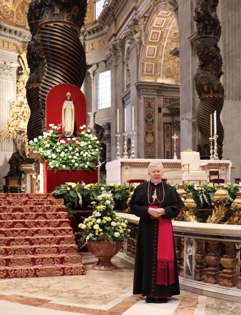 Archbishop Michael Neary in St Peters Basilica with Statue of Our Lady of Knock